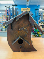 Whimsical metal bird house