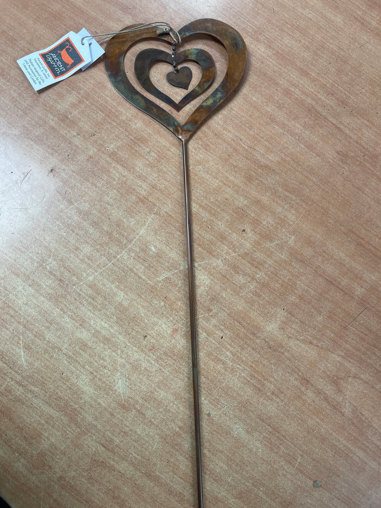 Ancient graffiti heart garden stake