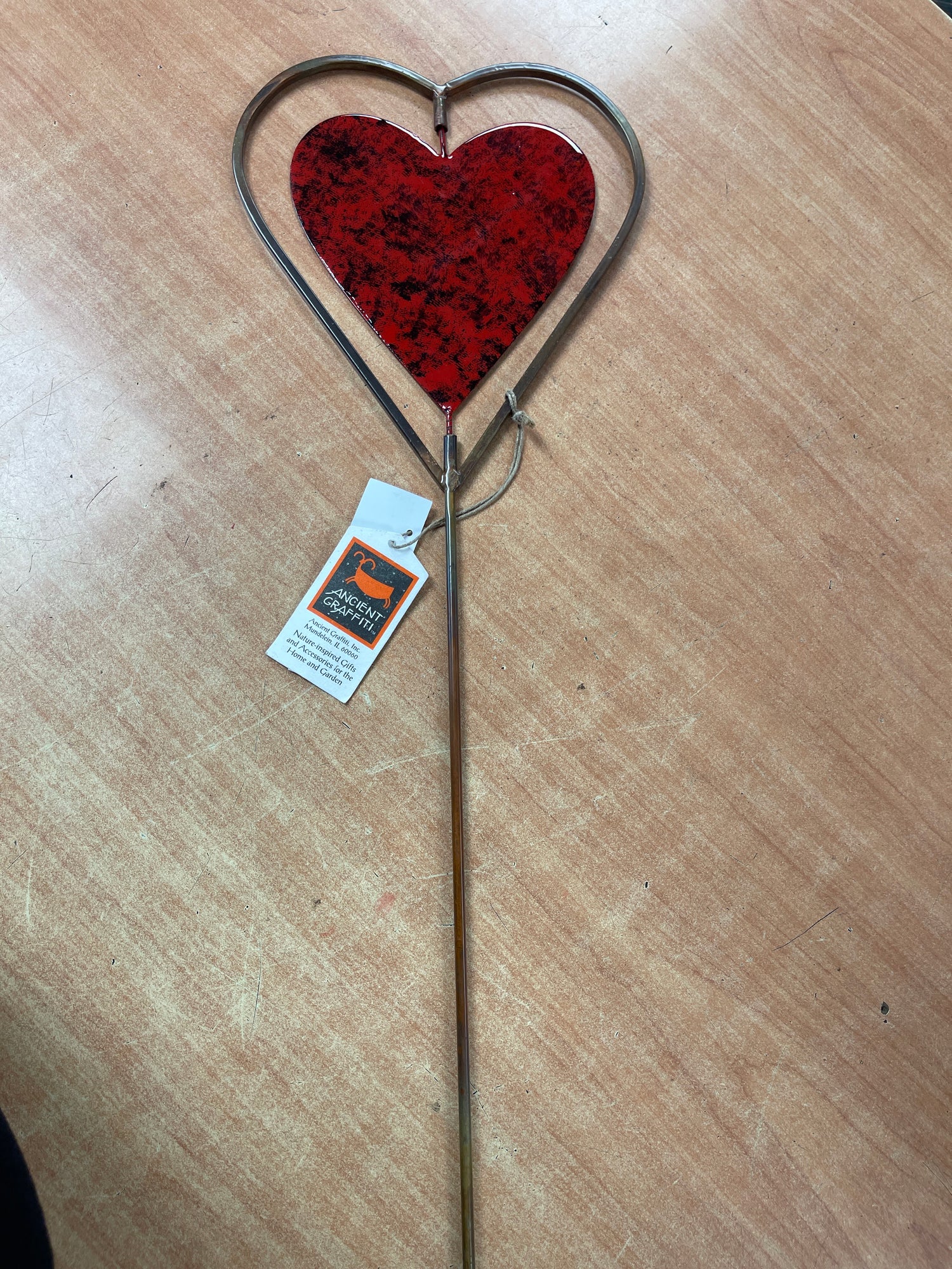 Ancient graffiti heart garden stake